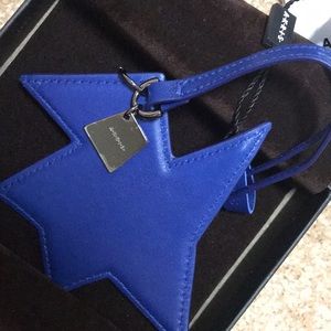 Akris leather handbag charm